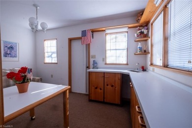 One level ranch in Pine Knolls subdivision!  This property has on Pine Knolls Golf Course in North Carolina - for sale on GolfHomes.com, golf home, golf lot