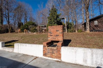 One level ranch in Pine Knolls subdivision!  This property has on Pine Knolls Golf Course in North Carolina - for sale on GolfHomes.com, golf home, golf lot