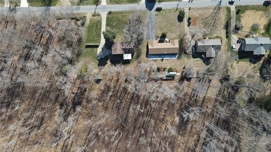 One level ranch in Pine Knolls subdivision!  This property has on Pine Knolls Golf Course in North Carolina - for sale on GolfHomes.com, golf home, golf lot