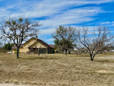 GREAT PRICE on a large, level interior lot on a quiet street in on Apple Rock Golf Course - Horseshoe Bay in Texas - for sale on GolfHomes.com, golf home, golf lot