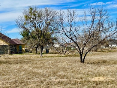 GREAT PRICE on a large, level interior lot on a quiet street in on Apple Rock Golf Course - Horseshoe Bay in Texas - for sale on GolfHomes.com, golf home, golf lot