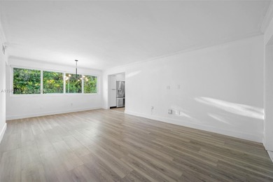 Refined two-story residence in North Coral Gables, set along a on Granada Golf Club in Florida - for sale on GolfHomes.com, golf home, golf lot