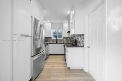 Refined two-story residence in North Coral Gables, set along a on Granada Golf Club in Florida - for sale on GolfHomes.com, golf home, golf lot