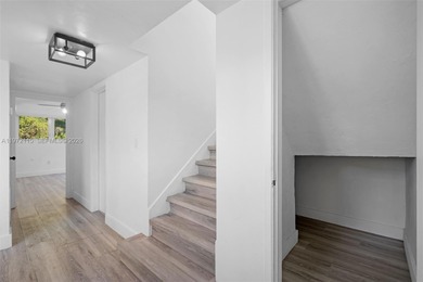 Refined two-story residence in North Coral Gables, set along a on Granada Golf Club in Florida - for sale on GolfHomes.com, golf home, golf lot