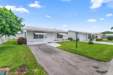 Welcome to your new home in Boynton Beach's desirable on Leisureville Community Golf Course in Florida - for sale on GolfHomes.com, golf home, golf lot