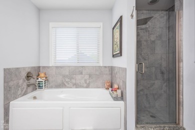 Welcome to this beautifully maintained 4-bedroom, 2.5-bathroom on Boulder Pointe Golf Club and Conference Center in Michigan - for sale on GolfHomes.com, golf home, golf lot