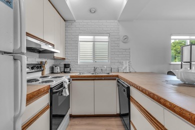 Full 2 side Duplex - A Fantastic Investment Opportunity! Live in on Key Colony Beach Golf Course in Florida - for sale on GolfHomes.com, golf home, golf lot