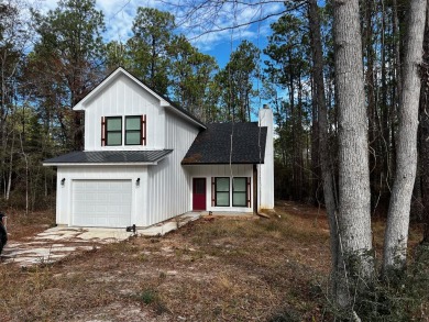 Discover tranquility in this secluded haven situated in the on Rayburn Country Club in Texas - for sale on GolfHomes.com, golf home, golf lot