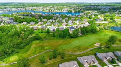 Welcome to this beautifully maintained 4-bedroom, 2.5-bathroom on Boulder Pointe Golf Club and Conference Center in Michigan - for sale on GolfHomes.com, golf home, golf lot