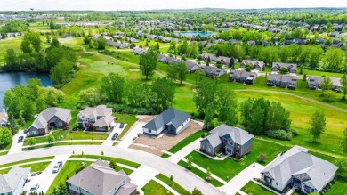 Welcome to this beautifully maintained 4-bedroom, 2.5-bathroom on Boulder Pointe Golf Club and Conference Center in Michigan - for sale on GolfHomes.com, golf home, golf lot