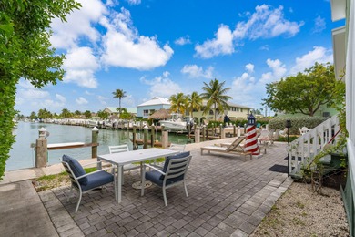 Full 2 side Duplex - A Fantastic Investment Opportunity! Live in on Key Colony Beach Golf Course in Florida - for sale on GolfHomes.com, golf home, golf lot