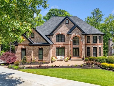 Experience resort-style living on over an acre in this stunning on Alpharetta Athletic Club East in Georgia - for sale on GolfHomes.com, golf home, golf lot