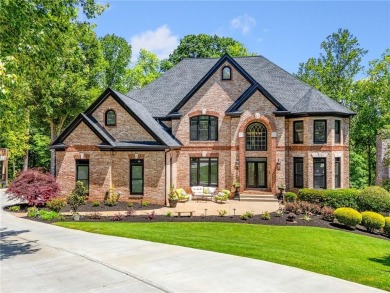 Experience resort-style living on over an acre in this stunning on Alpharetta Athletic Club East in Georgia - for sale on GolfHomes.com, golf home, golf lot