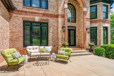 Experience resort-style living on over an acre in this stunning on Alpharetta Athletic Club East in Georgia - for sale on GolfHomes.com, golf home, golf lot