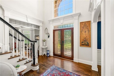 Experience resort-style living on over an acre in this stunning on Alpharetta Athletic Club East in Georgia - for sale on GolfHomes.com, golf home, golf lot