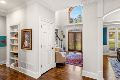 Experience resort-style living on over an acre in this stunning on Alpharetta Athletic Club East in Georgia - for sale on GolfHomes.com, golf home, golf lot