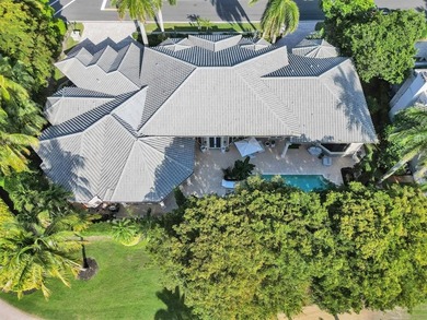 MOTIVATED SELLER!!! This 5,762 sq ft residence offers soaring on Boca Grove Golf and Tennis in Florida - for sale on GolfHomes.com, golf home, golf lot