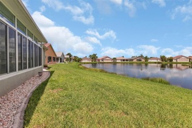 SENSATIONAL WATER VIEW from a MASSIVE enclosed and tiled lanai on Kings Gate Golf Club in Florida - for sale on GolfHomes.com, golf home, golf lot