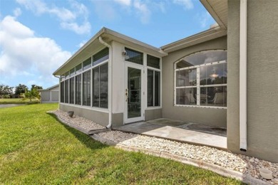 SENSATIONAL WATER VIEW from a MASSIVE enclosed and tiled lanai on Kings Gate Golf Club in Florida - for sale on GolfHomes.com, golf home, golf lot