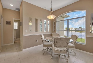 SENSATIONAL WATER VIEW from a MASSIVE enclosed and tiled lanai on Kings Gate Golf Club in Florida - for sale on GolfHomes.com, golf home, golf lot