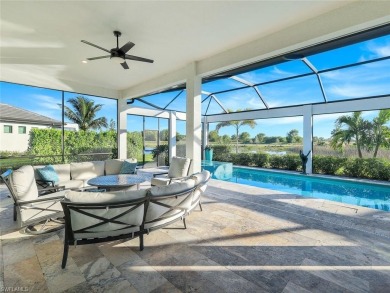 Sophisticated, serene, contemporary, and warm, this absolutely on The Golf Club At Fiddlers Creek in Florida - for sale on GolfHomes.com, golf home, golf lot