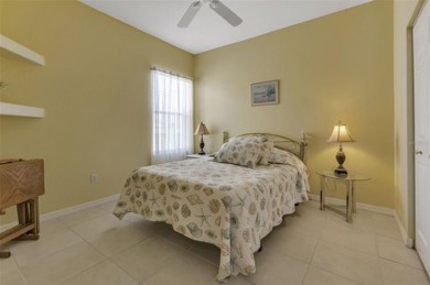 SENSATIONAL WATER VIEW from a MASSIVE enclosed and tiled lanai on Kings Gate Golf Club in Florida - for sale on GolfHomes.com, golf home, golf lot