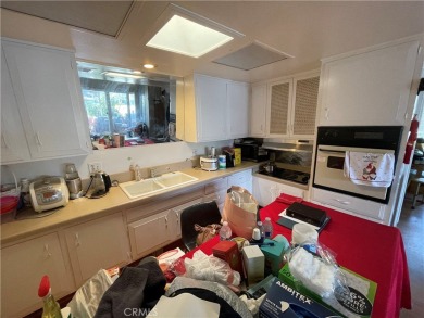 **Charming Corner Unit in Leisure World - Comfortable Living on Leisure World Seal Beach Golf Course in California - for sale on GolfHomes.com, golf home, golf lot