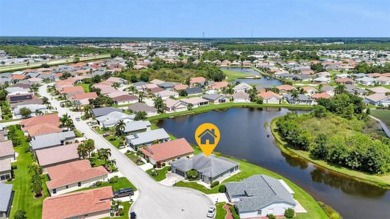SENSATIONAL WATER VIEW from a MASSIVE enclosed and tiled lanai on Kings Gate Golf Club in Florida - for sale on GolfHomes.com, golf home, golf lot
