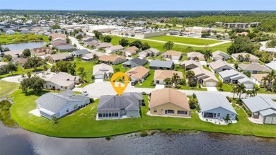SENSATIONAL WATER VIEW from a MASSIVE enclosed and tiled lanai on Kings Gate Golf Club in Florida - for sale on GolfHomes.com, golf home, golf lot
