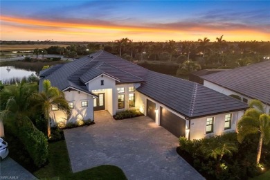 Sophisticated, serene, contemporary, and warm, this absolutely on The Golf Club At Fiddlers Creek in Florida - for sale on GolfHomes.com, golf home, golf lot