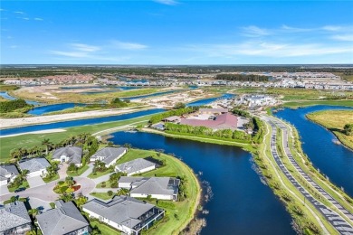 Sophisticated, serene, contemporary, and warm, this absolutely on The Golf Club At Fiddlers Creek in Florida - for sale on GolfHomes.com, golf home, golf lot