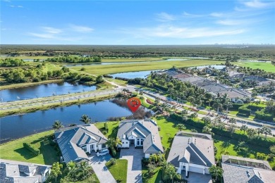 Sophisticated, serene, contemporary, and warm, this absolutely on The Golf Club At Fiddlers Creek in Florida - for sale on GolfHomes.com, golf home, golf lot