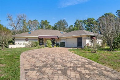 One or more photo(s) has been virtually staged. Charming Home in on Sugarmill Woods Golf and Country Club in Florida - for sale on GolfHomes.com, golf home, golf lot