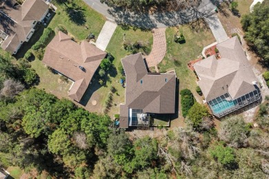 One or more photo(s) has been virtually staged. Charming Home in on Sugarmill Woods Golf and Country Club in Florida - for sale on GolfHomes.com, golf home, golf lot
