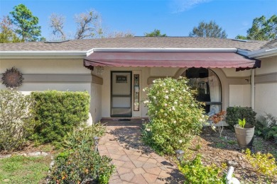 One or more photo(s) has been virtually staged. Charming Home in on Sugarmill Woods Golf and Country Club in Florida - for sale on GolfHomes.com, golf home, golf lot
