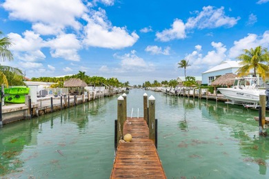 Full 2 side Duplex - A Fantastic Investment Opportunity! Live in on Key Colony Beach Golf Course in Florida - for sale on GolfHomes.com, golf home, golf lot