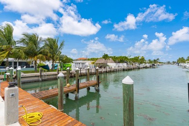 Full 2 side Duplex - A Fantastic Investment Opportunity! Live in on Key Colony Beach Golf Course in Florida - for sale on GolfHomes.com, golf home, golf lot