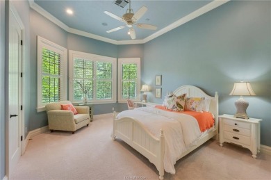 This custom estate sits on a rare 1.4-acre wooded lot backing to on The Traditions Club At Texas A and M in Texas - for sale on GolfHomes.com, golf home, golf lot