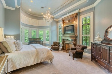 This custom estate sits on a rare 1.4-acre wooded lot backing to on The Traditions Club At Texas A and M in Texas - for sale on GolfHomes.com, golf home, golf lot