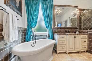 This custom estate sits on a rare 1.4-acre wooded lot backing to on The Traditions Club At Texas A and M in Texas - for sale on GolfHomes.com, golf home, golf lot