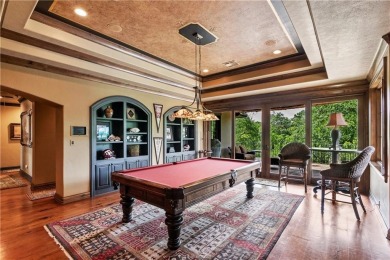 This custom estate sits on a rare 1.4-acre wooded lot backing to on The Traditions Club At Texas A and M in Texas - for sale on GolfHomes.com, golf home, golf lot