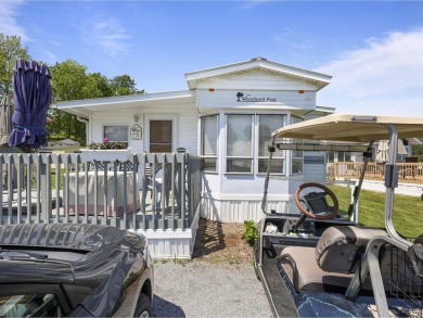 Welcome to this charming and well-maintained seasonal cottage in on Apple Island Golf Course At Apple Island Resort in Vermont - for sale on GolfHomes.com, golf home, golf lot