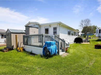 Welcome to this charming and well-maintained seasonal cottage in on Apple Island Golf Course At Apple Island Resort in Vermont - for sale on GolfHomes.com, golf home, golf lot