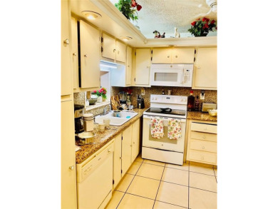 All Ages welcome in this Concord Village Condominium Complex on Colony West Country Club in Florida - for sale on GolfHomes.com, golf home, golf lot
