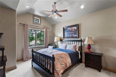 This custom estate sits on a rare 1.4-acre wooded lot backing to on The Traditions Club At Texas A and M in Texas - for sale on GolfHomes.com, golf home, golf lot