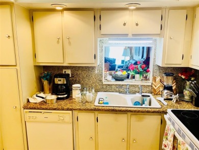 All Ages welcome in this Concord Village Condominium Complex on Colony West Country Club in Florida - for sale on GolfHomes.com, golf home, golf lot