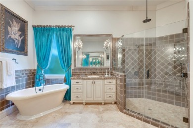 This custom estate sits on a rare 1.4-acre wooded lot backing to on The Traditions Club At Texas A and M in Texas - for sale on GolfHomes.com, golf home, golf lot