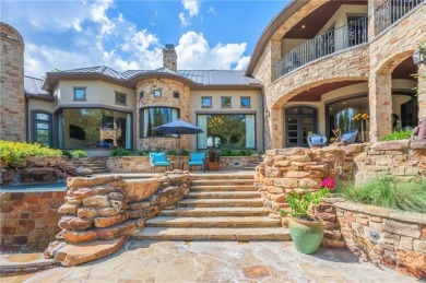 This custom estate sits on a rare 1.4-acre wooded lot backing to on The Traditions Club At Texas A and M in Texas - for sale on GolfHomes.com, golf home, golf lot