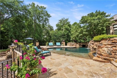 This custom estate sits on a rare 1.4-acre wooded lot backing to on The Traditions Club At Texas A and M in Texas - for sale on GolfHomes.com, golf home, golf lot