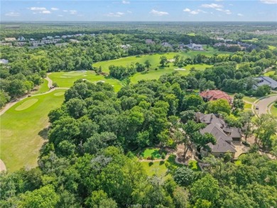 This custom estate sits on a rare 1.4-acre wooded lot backing to on The Traditions Club At Texas A and M in Texas - for sale on GolfHomes.com, golf home, golf lot